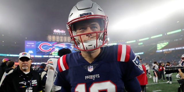 New England Patriots quarterback Mac Jones walks off the field after a 33-14 loss to the Chicago Bears Monday, Oct. 24, 2022, in Foxborough, Mass.