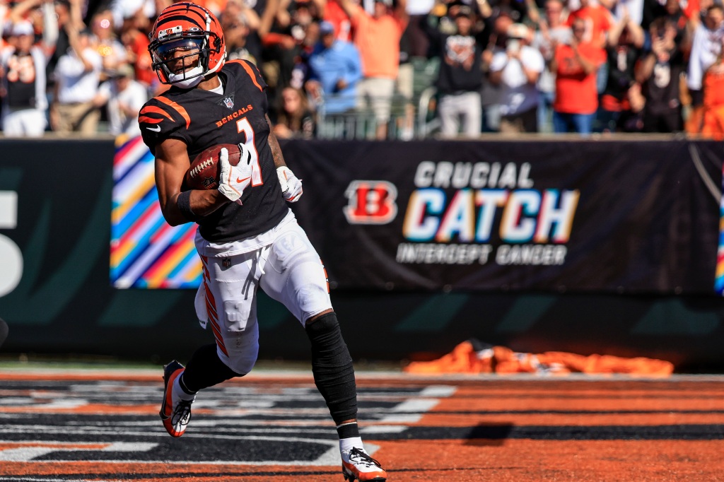 Ja'Marr Chase #1 of the Cincinnati Bengals reacts after scoring a touchdown against the Atlanta Falcons during the second quarter at Paul Brown Stadium on October 23, 2022 in Cincinnati, Ohio.
