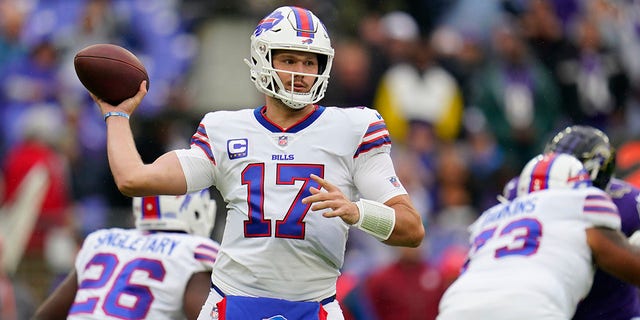 Buffalo Bills quarterback Josh Allen (17) passes against the Baltimore Ravens in the first half of an NFL football game Sunday, Oct. 2, 2022, in Baltimore. 