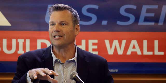 In this July 8, 2019 photo, former Kansas Secretary of State Kris Kobach addresses the crowd as he announces his candidacy for the Republican nomination for the U.S. Senate in Leavenworth, Kan.