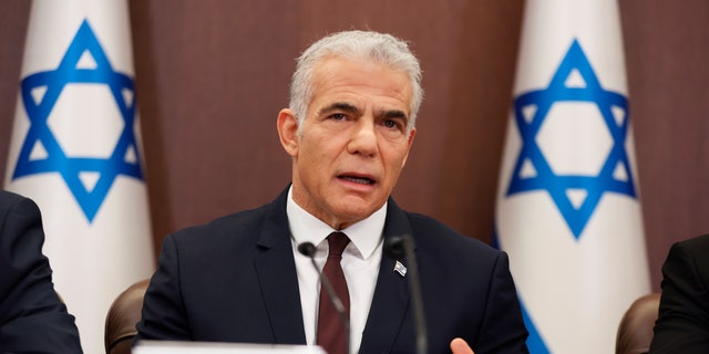 Israeli Prime Minister Yair Lapid attends a cabinet meeting at the prime minister's office in Jerusalem Oct. 23, 2022. 