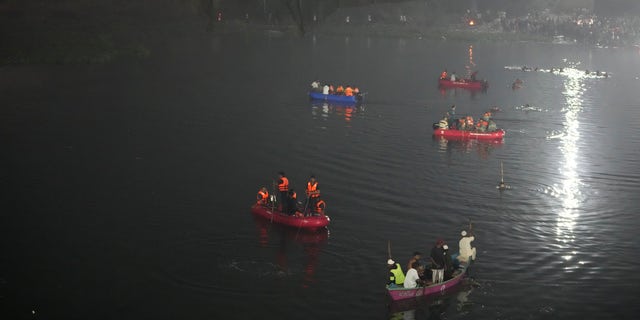 The century-old cable suspension bridge collapsed into the river Sunday evening, sending hundreds plunging in the water, officials said.