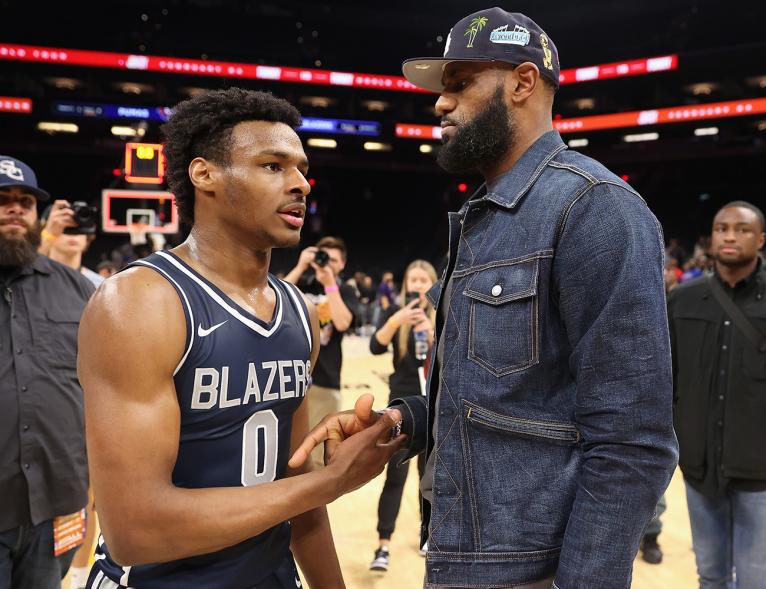 Lakers star LeBron James and his son Bronny James at the Hoophall West tournament at Footprint Center on Dec. 11, 2021 in Phoenix, Arizona.