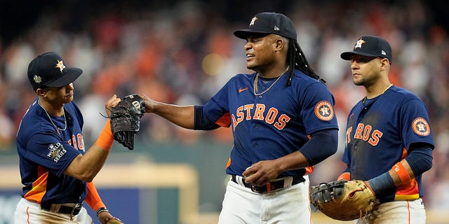 Astros starting pitcher Framber Valdez speaks with Jeremy Pena, left, on the mound during the World Series game against the Philadelphia Phillies on Saturday, Oct. 29, 2022, in Houston.