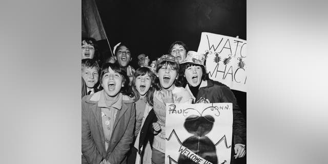 Screaming Beatles fans at Heathrow Airport in London in Sept. 1964. 
