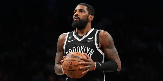 Kyrie Irving, of the Brooklyn Nets, prepares to shoot a free throw during the game against the Dallas Mavericks on October 27, 2022, at Barclays Center in Brooklyn, New York.  