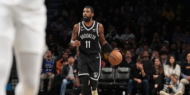 Kyrie Irving of the Brooklyn Nets dribbles the ball during a game against the Dallas Mavericks Oct. 27, 2022, at Barclays Center in Brooklyn, N.Y. 