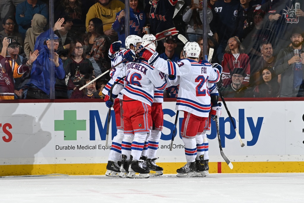 The Rangers celebrate during their win over the Coyotes.