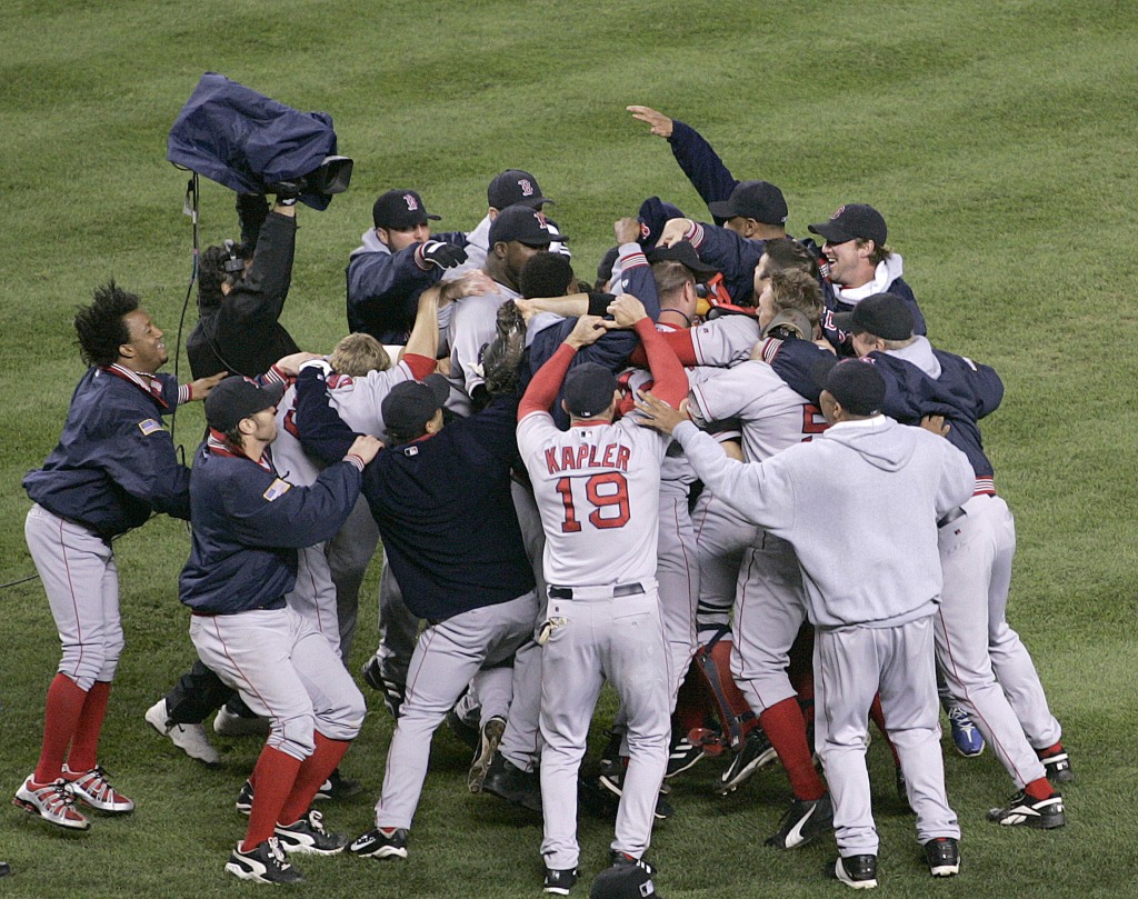 The Red Sox celebrate after eliminating the Yankees in the 2004 ALCS.