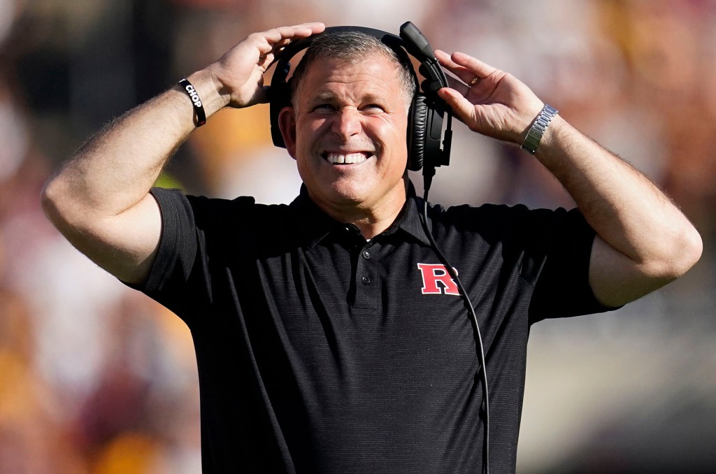 Rutgers coach Greg Schiano grimaces after one of Minnesota's touchdowns.