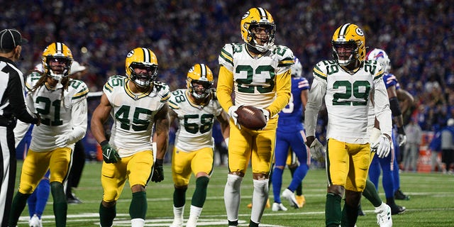 Green Bay Packers cornerback Jaire Alexander, #23, celebrates after intercepting a ball during the second half of an NFL football game against the Buffalo Bills Sunday, Oct. 30, 2022, in Orchard Park, New York.