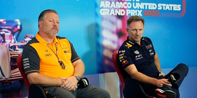 McLaren CEO Zak Brown, left, and Red Bull team principal Christian Horner, right, take part in a news conference at the Formula One U.S. Grand Prix auto race at Circuit of the Americas, Saturday, Oct. 22, 2022, in Austin, Texas.