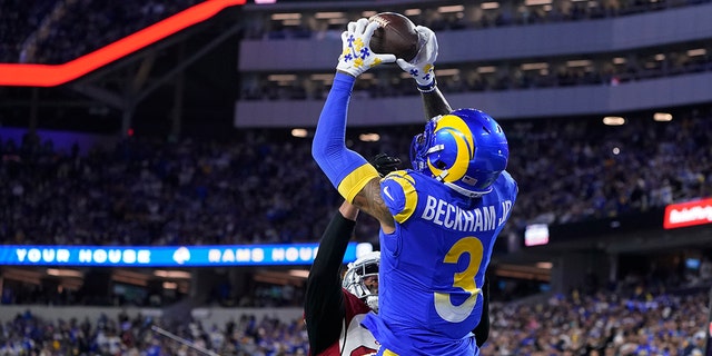 Los Angeles Rams wide receiver Odell Beckham Jr. catches a touchdown pass against Arizona Cardinals cornerback Marco Wilson during the first half of a wild-card playoff football game in Inglewood, Calif., Jan. 17, 2022.