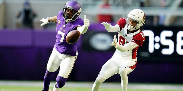 Minnesota Vikings cornerback Patrick Peterson (7) breaks up a pass intended for Arizona Cardinals wide receiver Robbie Anderson (81) during the second half of an NFL football game, Sunday, Oct. 30, 2022, in Minneapolis.