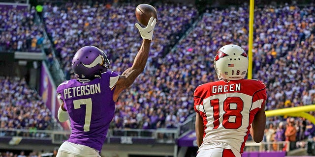 Minnesota Vikings Cornerback Patrick Peterson (7) breaks up a pass intended for Arizona Cardinals wide receiver A.J. Green (18) during the first quarter of a game between the Minnesota Vikings and Arizona Cardinals on October 30, 2022, at U.S. Bank Stadium in Minneapolis, MN.