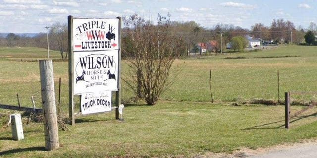 A Google Earth image shows the entrance to Triple W Arena and Livestock Auction in Cookeville, Tenn.