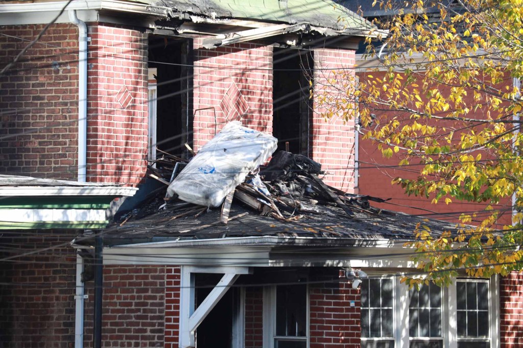 The Quimby Avenue home is seen damaged after the fire was extinguished.