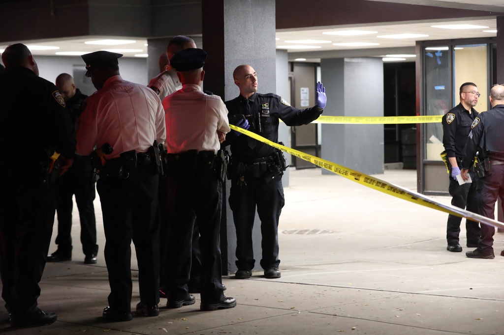 NYPD cops investigate a crime on the subways.