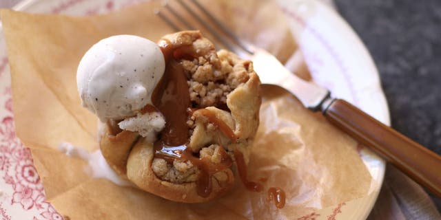 These mini caramel apple pies from Studio Delicious are made with peeled apples, cinnamon, nutmeg and vanilla.
