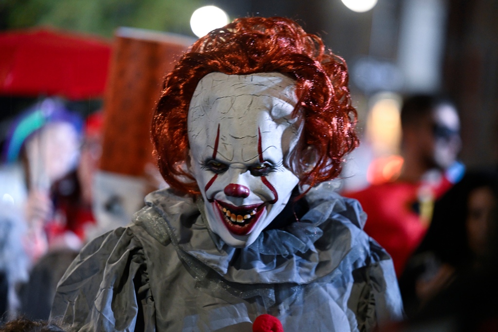 A vicious clown walks in the 49th Annual Halloween Parade on Oct. 31, 2022 in Manhattan.