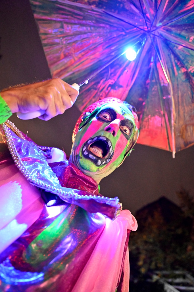 A neon-painted participant poses during the 49th Annual Halloween Parade on Oct. 31, 2022 in Manhattan.