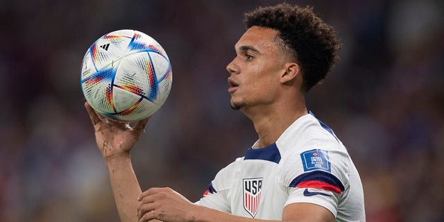 Antonee Robinson of USA prepares to take a throw in during the FIFA World Cup Qatar 2022 Group B match between USA and Wales at Ahmad Bin Ali Stadium on November 21, 2022 in Doha, Qatar. 