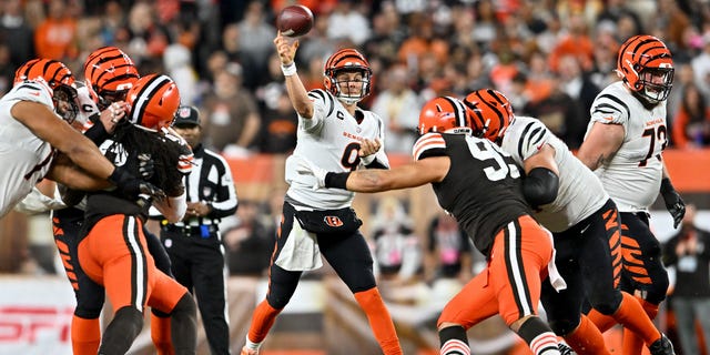 Joe Burrow #9 of the Cincinnati Bengals throws a pass in the first half against the Cleveland Browns at FirstEnergy Stadium on October 31, 2022 in Cleveland, Ohio.